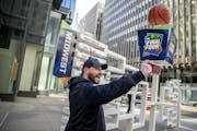 Brad Hardin took a selfie as he found his favorite team, North Carolina, on a 3-D sculpture of the Final Four bracket on the Nicollet Mall just outsid