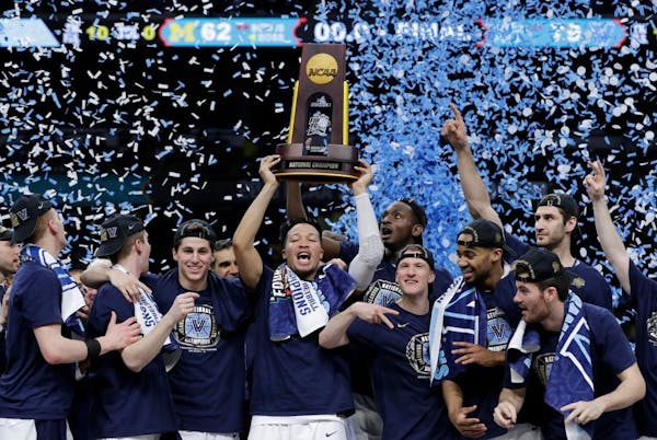 Villanova players celebrated winning the 2018 Final Four. Which team will bring home the trophy next week at U.S. Bank Stadium?