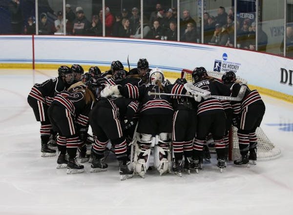 Hamlnie players gathered before the NCAA Division III women's hockey championship game aganist Plattsburgh State on March 16, 2019, at St. Thomas Ice 