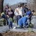 Prairie Island Indian Community and volunteers built a berm Tuesday, March 19, 2019 as they prepare for flooding in the Prairie Island Indian Communit