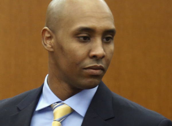 FILE - In this May 8, 2018, file photo, former Minneapolis police officer Mohamed Noor arrives at the Hennepin County Government Center for a hearing 