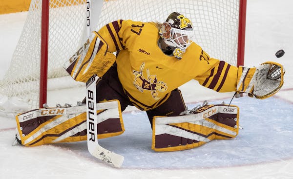 Gophers goalie Sydney Scobee makes a save last Sunday against Wisconsin at Ridder Arena.