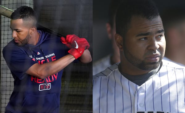 Eddie Rosario, left, is an up-and-coming star for the Twins. He is no relation to Wilin Rosario, right, who is trying to recapture the success he had 