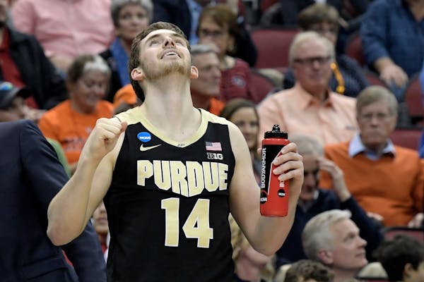 Purdue guard Ryan Cline celebrated in overtime. Cline fouled out in OT, but the Boilermakers did enough to hang on against Tennessee.