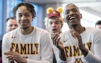 Amir Coffey and Dupree McBrayer reacted after the Gophers received 10 seed in NCAA tournament, will play 7 seed Louisville on Thursday in Des Moines.