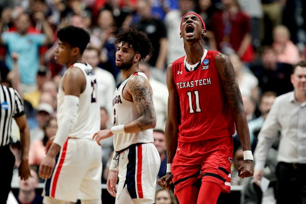 Forward Tariq Owens illustrated the intensity of Texas Tech’s defense as he celebrated a blocked shot against Gonzaga in the second half of the Red 