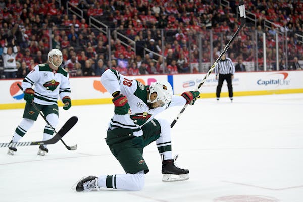 Wild left wing Jordan Greenway celebrates his goal during the first period