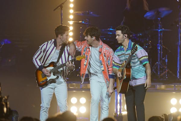 Nick, Joe and Kevin Jonas came together as the Jonas Brothers headlined at the Armory in Minneapolis as part of Final Four Festivities on Saturday nig