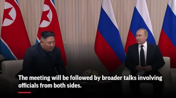 Putin and Kim shake hands at start of talks
