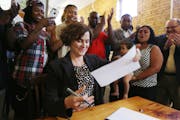 In May 2016, then-Minneapolis Mayor Betsy Hodges signed the landmark earned sick and safe time ordinance at the Common Roots Cafe.