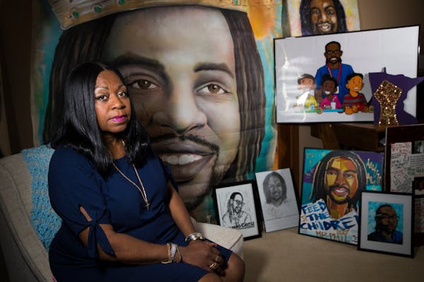 Photo by Renee Jones Schneider: Valerie Castile, mother of Philando Castile, with artwork inspired by her son's death in 2016.