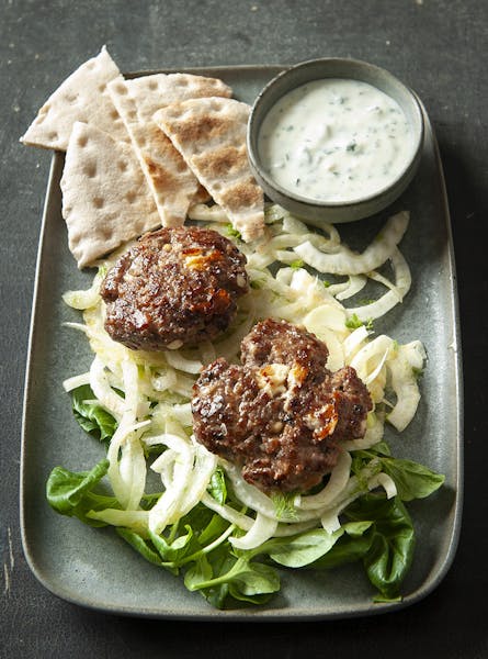 Lamb Burgers on Fennel Slaw With Mint-Garlic Sauce. METTE NIELSEN • Special to the Star Tribune
