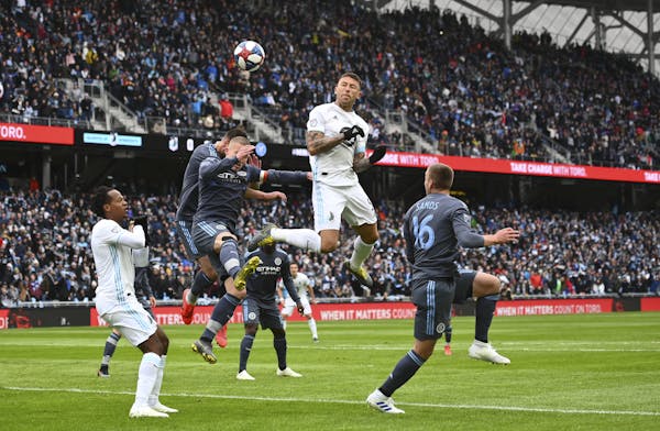 United defender Francisco Calvo (5) jumped for a header in the first half off a corner kick against New York City in the Allianz Field opener on April