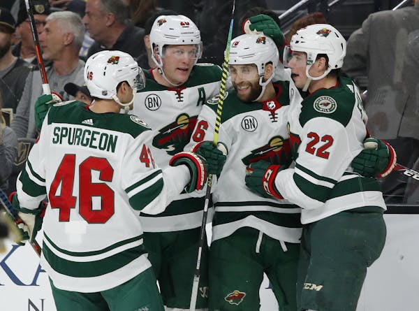Jason Zucker, second from right, had two assists as the Wild built a three-goal lead Friday night at Vegas but failed to gain in the standings.