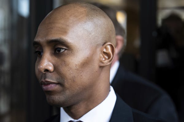 Former Minneapolis police officer Mohamed Noor left the Hennepin County Government Center after the first day of trial in Minneapolis on Monday, April