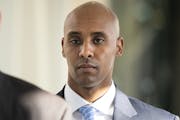 Former Minneapolis police officer Mohamed Noor walks to court on Tuesday.