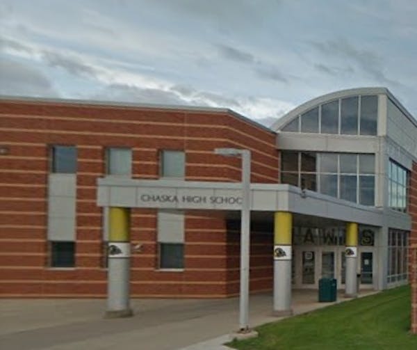 Officials at Chaska High School delayed yearbook distribution after finding a photo of a student in blackface.