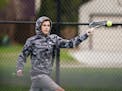 Minneapolis Edison tennis player Logan Couillard returned a shot while he played in a match against Minneapolis South on May 6 in Minneapolis. Photo: 