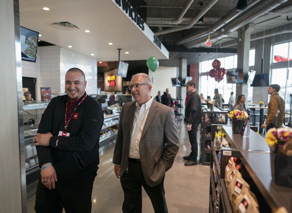Cub store manger Mike Gruwell left and Cub's new CEO Mike Stigers walked the space at the new Cub's grand opening Thursday May 2, 2019 in Minneapolis,