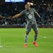 Minnesota United defender Romain Metanire (19) and forward Angelo Rodriguez (9) slapped hands in the second half during a game earlier this month. The