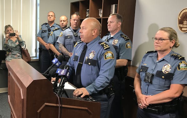 St. Paul Police Chief Todd Axtell announced the firing of five police officers for failing to intervene in an assault last year.