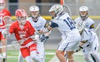 Benilde-St. Margaret’s Matt Dowden (5) scrambled through traffic in a victory over Mahtomedi in April. The Red Knights enter the state tournament un
