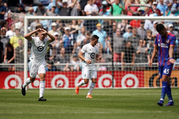 Minnesota United midfielder Hassani Dotson made a heart for fans after he scored in the first half.