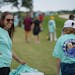 Julie Lovaas, part of Amy Olson’s sponsorship team, passed out “Amy’s Army” T-shirts on Thursday at Hazeltine. Olson played for North Dakota S