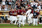New Prague players celebrated in front of their fans at CHS Field last Friday after defeating Blaine in the Class 4A semifinals. Photo: NICOLE NERI �