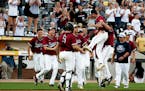 New Prague players celebrated in front of their fans at CHS Field last Friday after defeating Blaine in the Class 4A semifinals. Photo: NICOLE NERI �