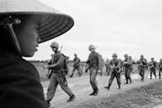 Marines marching in Danang during the Vietnam War — a war that David Pence says he regrettably protested in the ’60s.