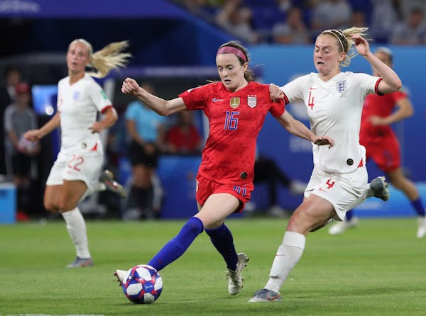 United States' Rose Lavelle, left, and England's Keira Walsh challenged for the ball during the Women's World Cup semifinal on Tuesday.