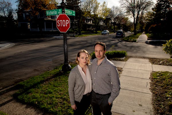 Christina Anderson-Taghioff and Simon Taghioff near their home in St. Paul in May. He was among those attending City Council meetings in April to chal