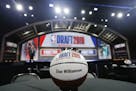 A basketball marks a table for NBA Draft prospect Zion Williamson, of Duke, before the start of the NBA basketball draft, Thursday, June 20, 2019, in 