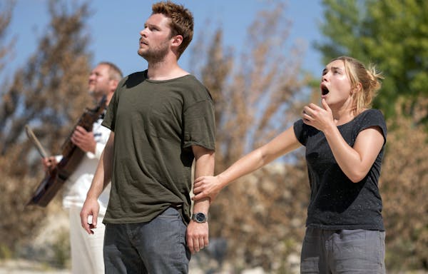 Jack Reynor and Florence Pugh in “Midsommar.”