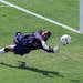 U.S. women's team goalkeeper Briana Scurry blocked a penalty shootout kick by China’s Ying Liu during overtime of the World Cup Final at the Rose Bo