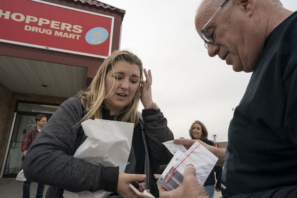 Quinn Nystrom left showed her dad Bob Nystrom insulin outside Shoppers Drug Market pharmacy Saturday May 4, 2019 in Ft. Frances, Ontario. She was one 