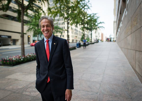 Norm Coleman outside his Washington, D.C. office in 2015. Coleman announced Tuesday that he will undergo surgery later this month to remove part of hi