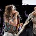 Aerosmith singer Steven Tyler, left, and guitarist Joe Perry perform at the Nassau Coliseum in Uniondale, N.Y., July 1, 2012.