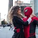 M.J. (Zendaya) catches a ride from Spider-Man (Tom Holland) in “Spider-Man: Far From Home.”