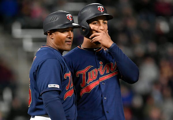 Twins third base coach Tony Diaz talked with Eddie Rosario at Target Field earlier this season.