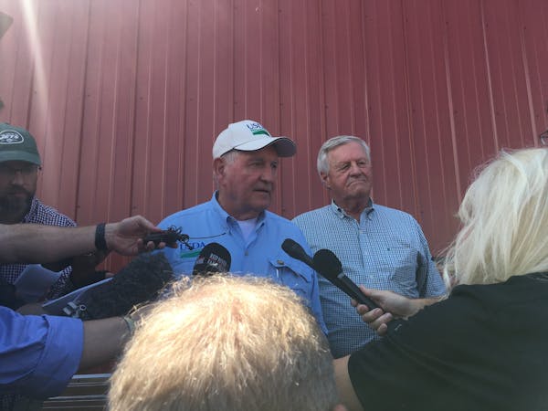 U.S. Secretary of Agriculture Sonny Perdue and Rep. Collin Peterson, right, spoke to reporters at FarmFest, near Morgan, Minn., on Wednesday.