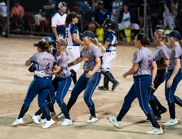The Aussie Peppers celebrated their comeback victory in the bottom of the seventh inning against the Canadian Wild on July 3 in North Mankato, Minn.