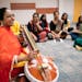 Musician and composer Nirmala Rajasekar held a veena — a seven-stringed instrument — during a practice session in Brooklyn Center. Rajasekar offer