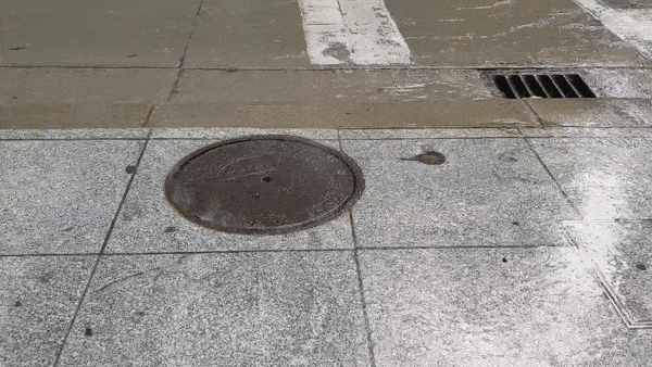 Tony Perkins captured this manhole cover dancing over its opening in downtown Minneapolis during a recent storm.