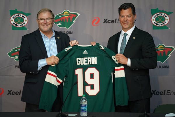 Minnesota Wild owner Craig Leipold, left, introduced new Wild General Manager Bill Guerin