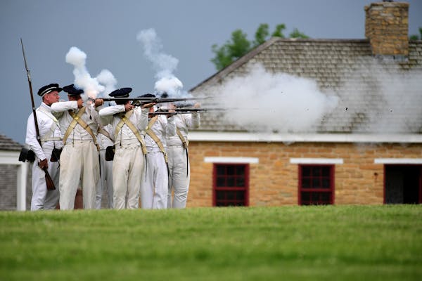 Reenactors fired off their 1816 Harper’s Ferry muskets during an infantry demonstration Saturday at Historic Fort Snelling.