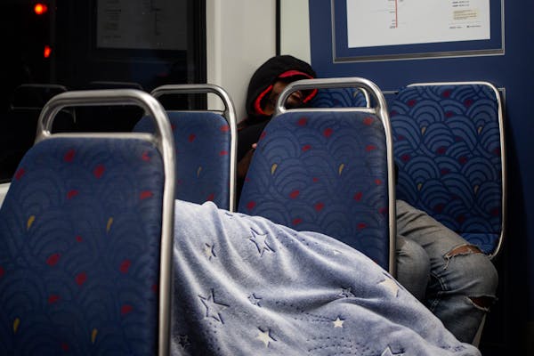 Two people slept on the Green Line train early on a Friday morning.