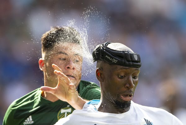 Sweat flew off the head of Minnesota United defender Ike Opara (3) during the Aug. 4 game against Portland at Allianz Field. He has worn the protectiv