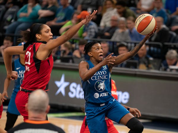 Lynx guard Danielle Robinson put up a first half shot against the defense of All-Star Aces center A'ja Wilson. Robinson finished with 23 points.